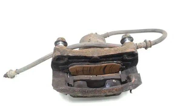 Nissan Juke I F15 Front brake caliper