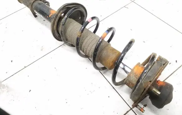 Mazda 323 Rear shock absorber with coil spring 