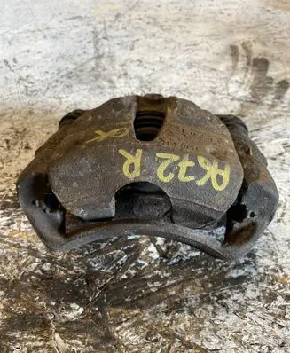 Opel Tigra B Front brake caliper 72764 IU7