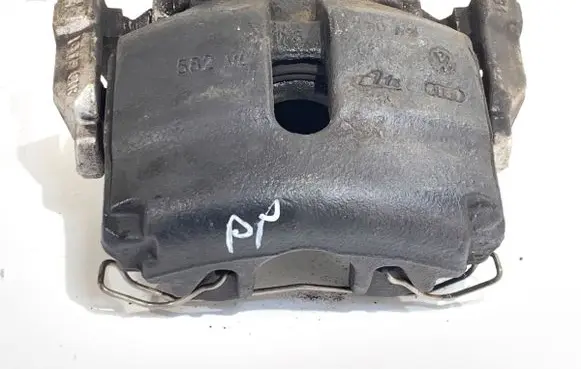 Volkswagen PASSAT B7 Front brake caliper 
