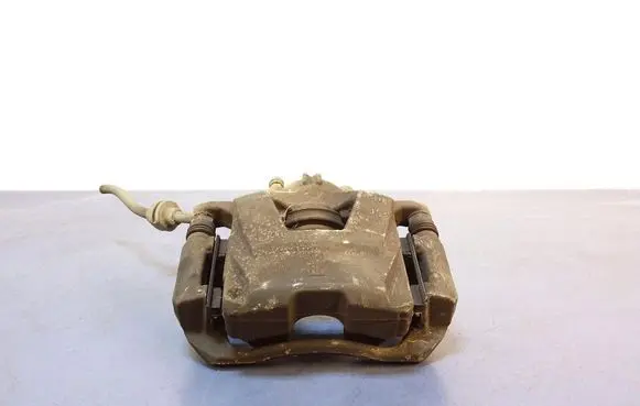 Opel Astra J Front brake caliper 