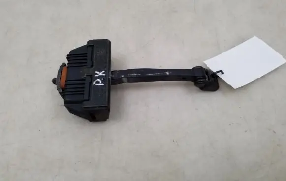 Front door check strap stopper