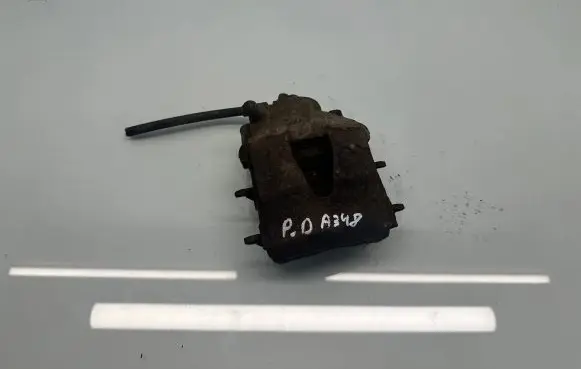 Volkswagen Golf VI Front brake caliper
