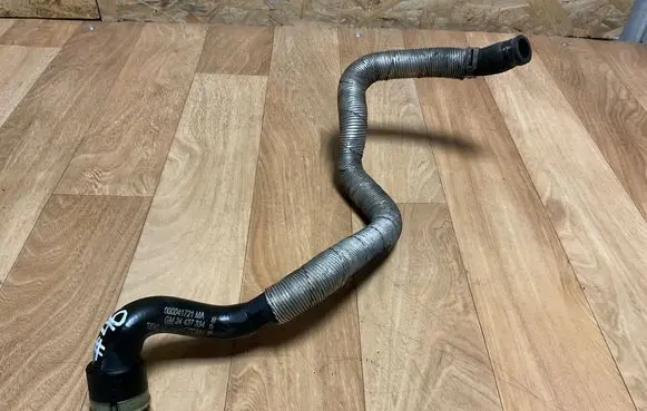 Opel Zafira A Engine coolant pipe/hose 24437334 000041721