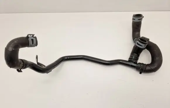 Volkswagen Golf VII Engine coolant pipe/hose 5Q0122058E 04L121058B