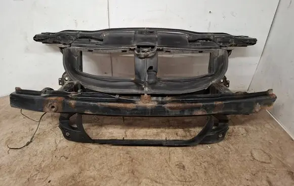 Radiator support slam panel
