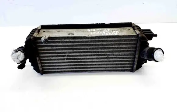 KIA Carens III Intercooler radiator 282702A480