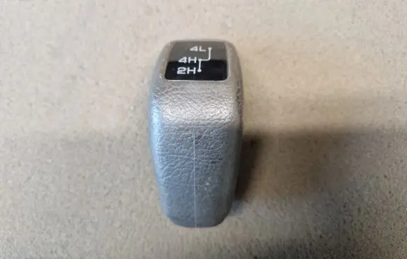 Mitsubishi Pajero Sport I Gear lever shifter trim leather/knob