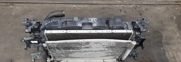 Radiator support slam panel