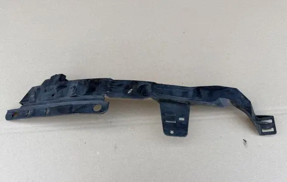 Opel Astra J Headlight/headlamp mounting bracket 13287639 13287641