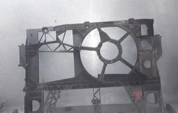 Radiator support slam panel