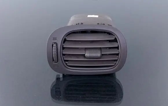 Chrysler Voyager Dash center air vent grill OSC91TRMAA 12050