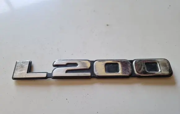 Mitsubishi L200 Front door emblem/model letters 