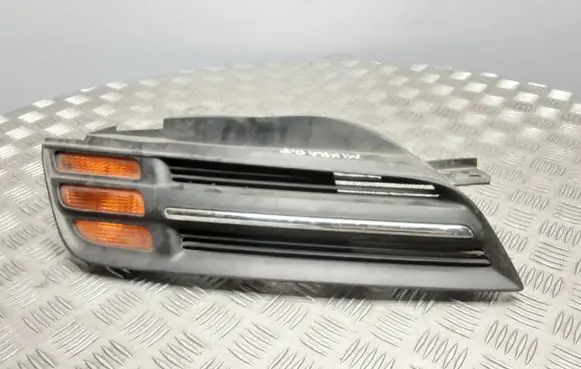 Nissan Micra Front bumper upper radiator grill 62320AX600