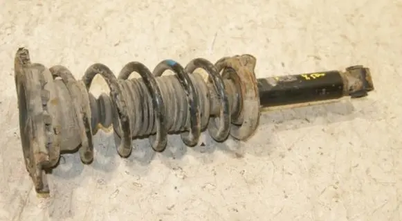 Nissan Primera Rear shock absorber with coil spring 562102F025