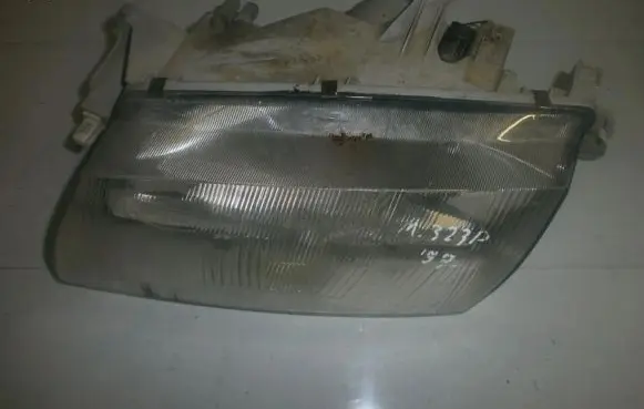 Mazda 323 Headlight/headlamp 1305235336