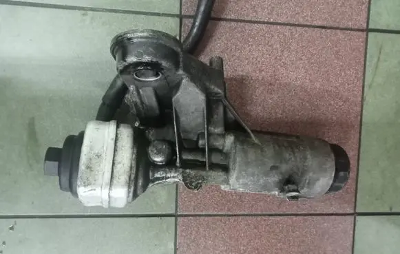 Volkswagen II LT Oil filter mounting bracket 038115466