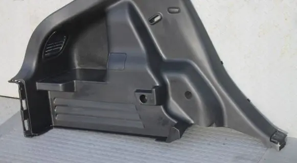 Trunk/boot side trim panel