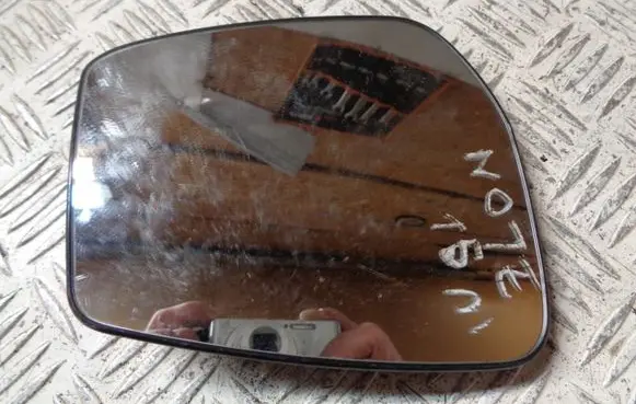 Nissan Note (E12) Wing mirror glass 212834406