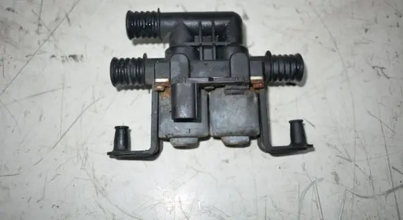 Coolant heater control valve