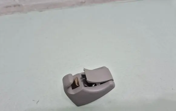 Sun visor clip/hook/bracket