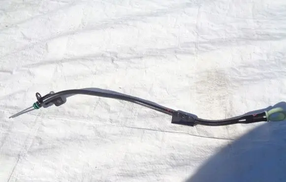 Oil level dip stick