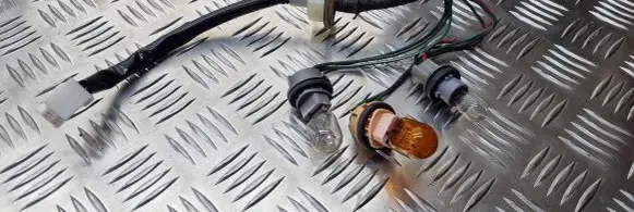Mazda 2 Tail light bulb cover holder