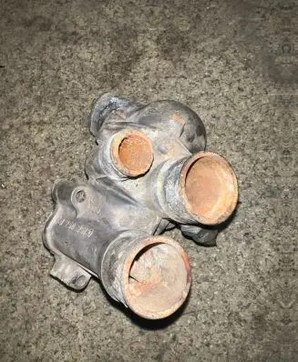 Thermostat/thermostat housing