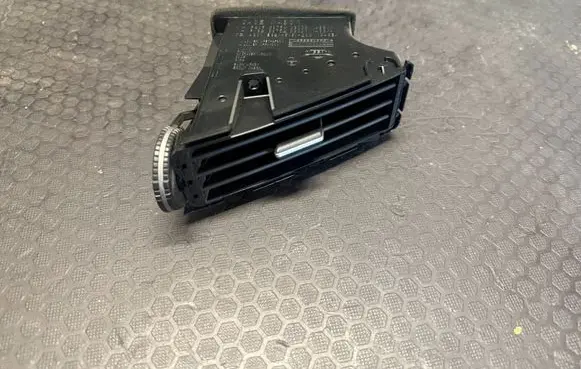 Dash center air vent grill