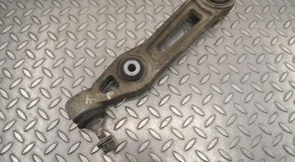 Tesla Model S Front lower control arm/wishbone 104895100A