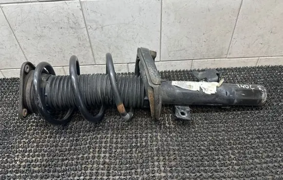 Front shock absorber with coil spring