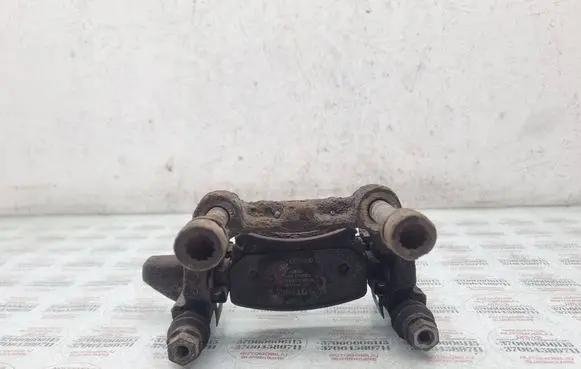 Volkswagen Touran I Brake caliper pad carrier rear