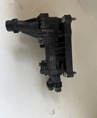 Thermostat/thermostat housing