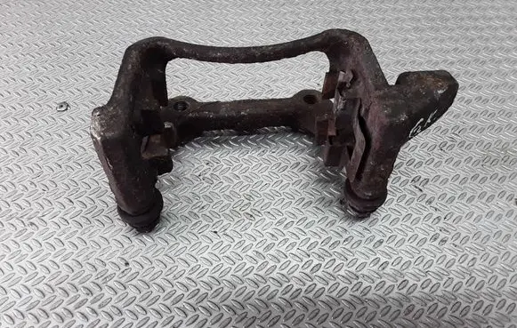 Volkswagen Touran I Brake caliper pad carrier rear 