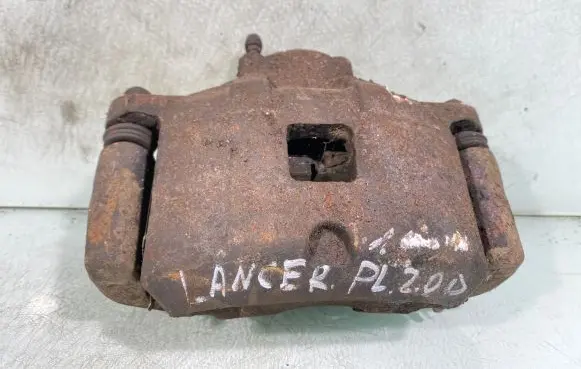Mitsubishi Lancer X Front brake caliper