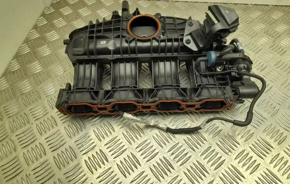 Volkswagen Polo VI Intake manifold 06L133201DH
