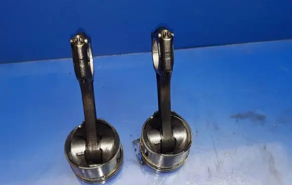 Piston with connecting rod