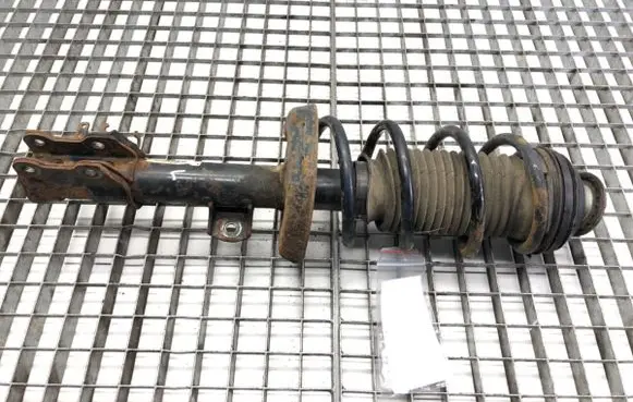 Opel Corsa D Front shock absorber/damper 13214359
