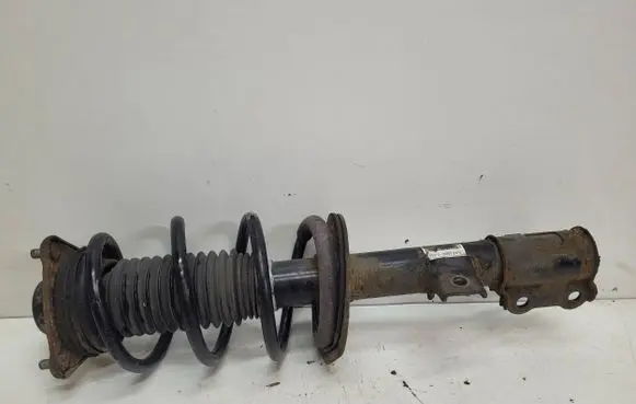 Front shock absorber with coil spring