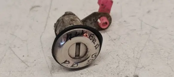 Nissan Almera N16 Coupe door lock (next to the handle) 