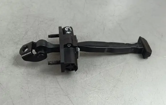 Polestar 2 Rear door check strap stopper