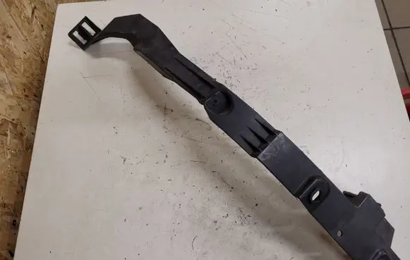 Opel Astra J Headlight/headlamp mounting bracket 13287640