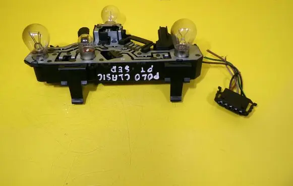 Tail light bulb cover holder