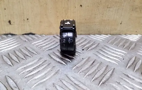 Headlight level height control switch