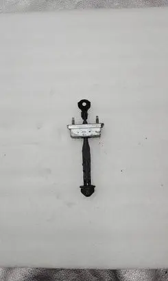 Front door check strap stopper