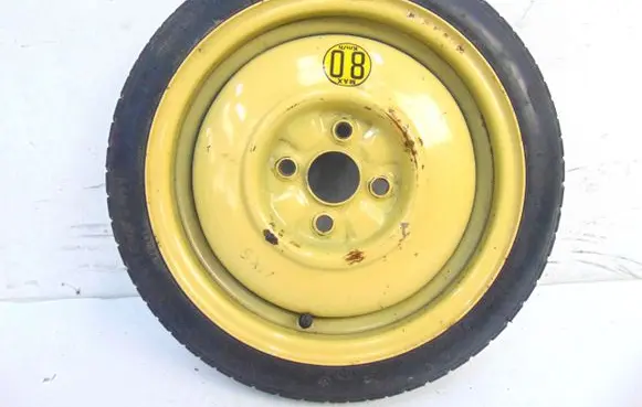 Mazda 323 Spare wheel mounting bracket 