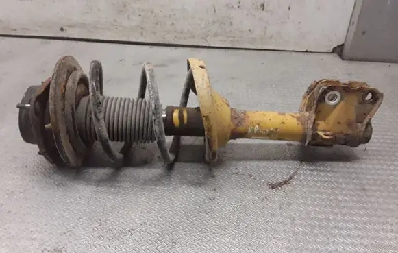 Subaru Legacy Front shock absorber with coil spring