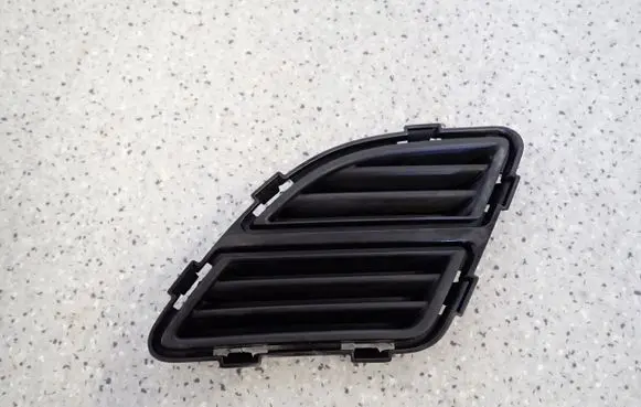 Suzuki Splash Front fog light trim/grill 71831-85L0