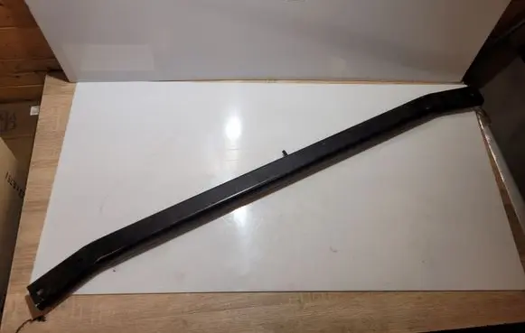 Top upper radiator support slam panel