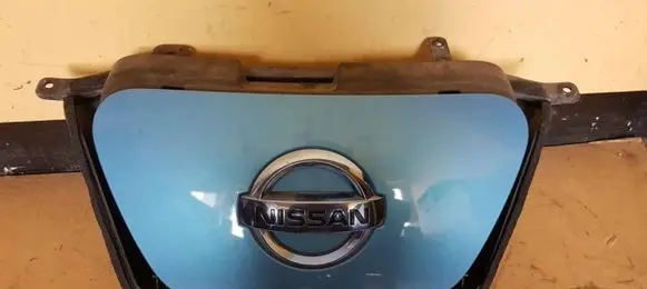 Nissan Leaf I (ZE0) Electric car charge socket cover 657303na4a